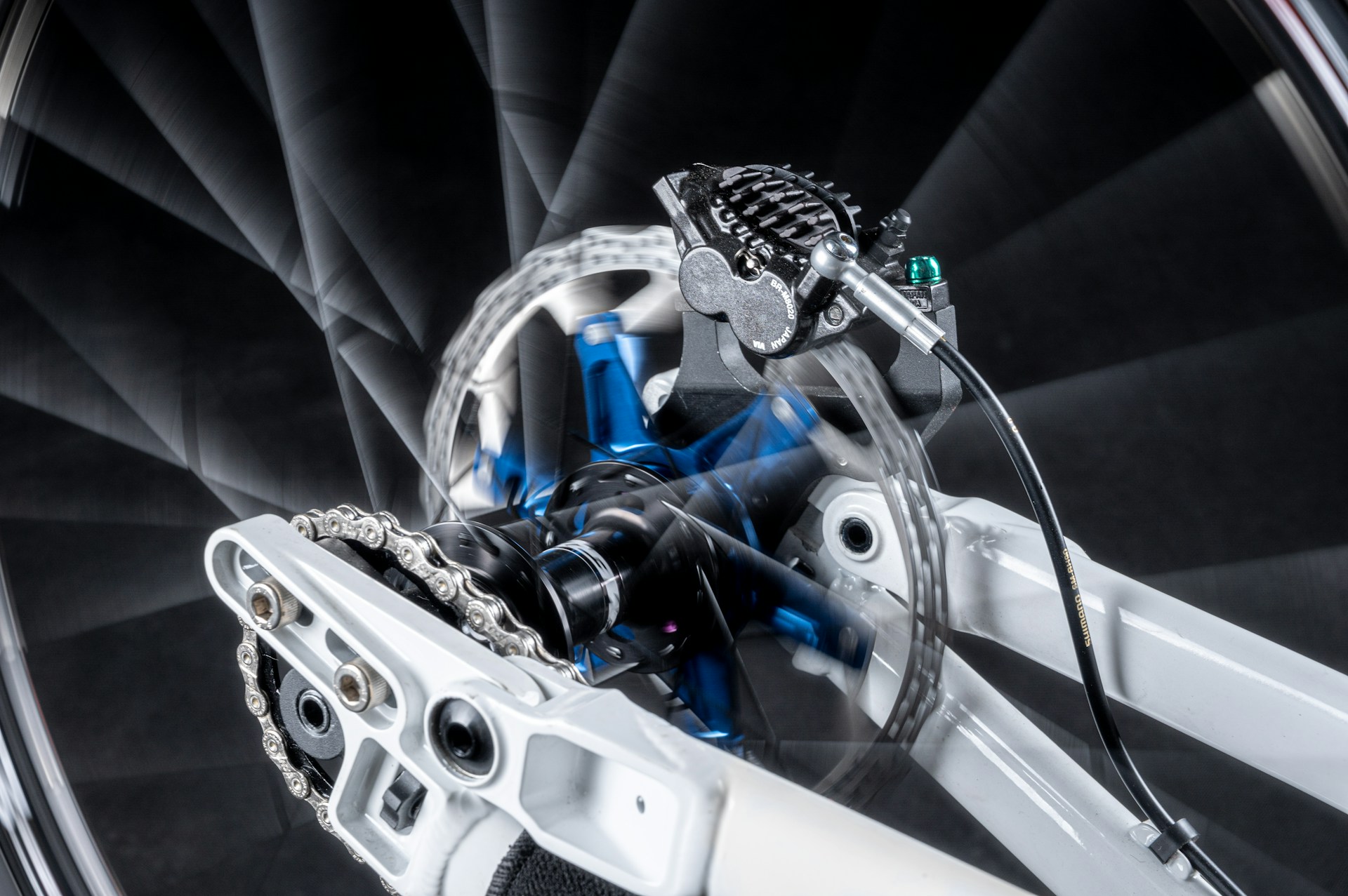 A- lose up of a bikes front wheel